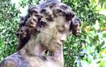 Biological growth and dirt are penetrating the marble, but it is not too late to save and preserve this beautiful marble sculpture.