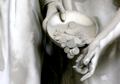 Delicate carving of marble coins