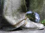 A detail of his boot showing the level of realistic craftsmanship and artistry.